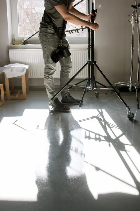 unrecognizable man setting photo